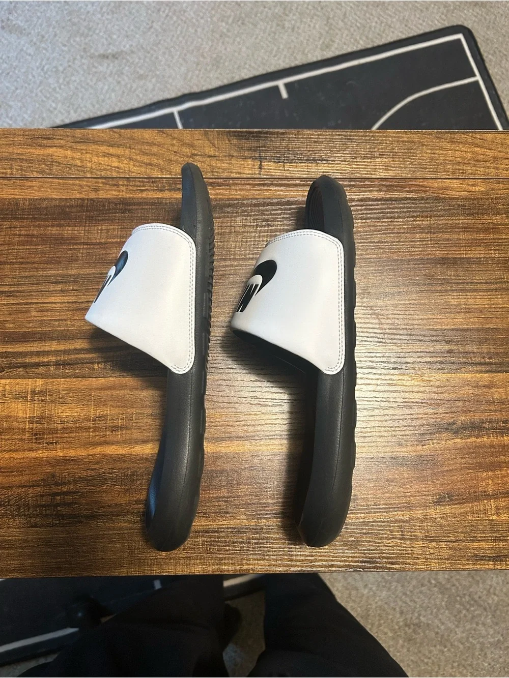 Nike Black and White Slide Sandals with Logo Strap